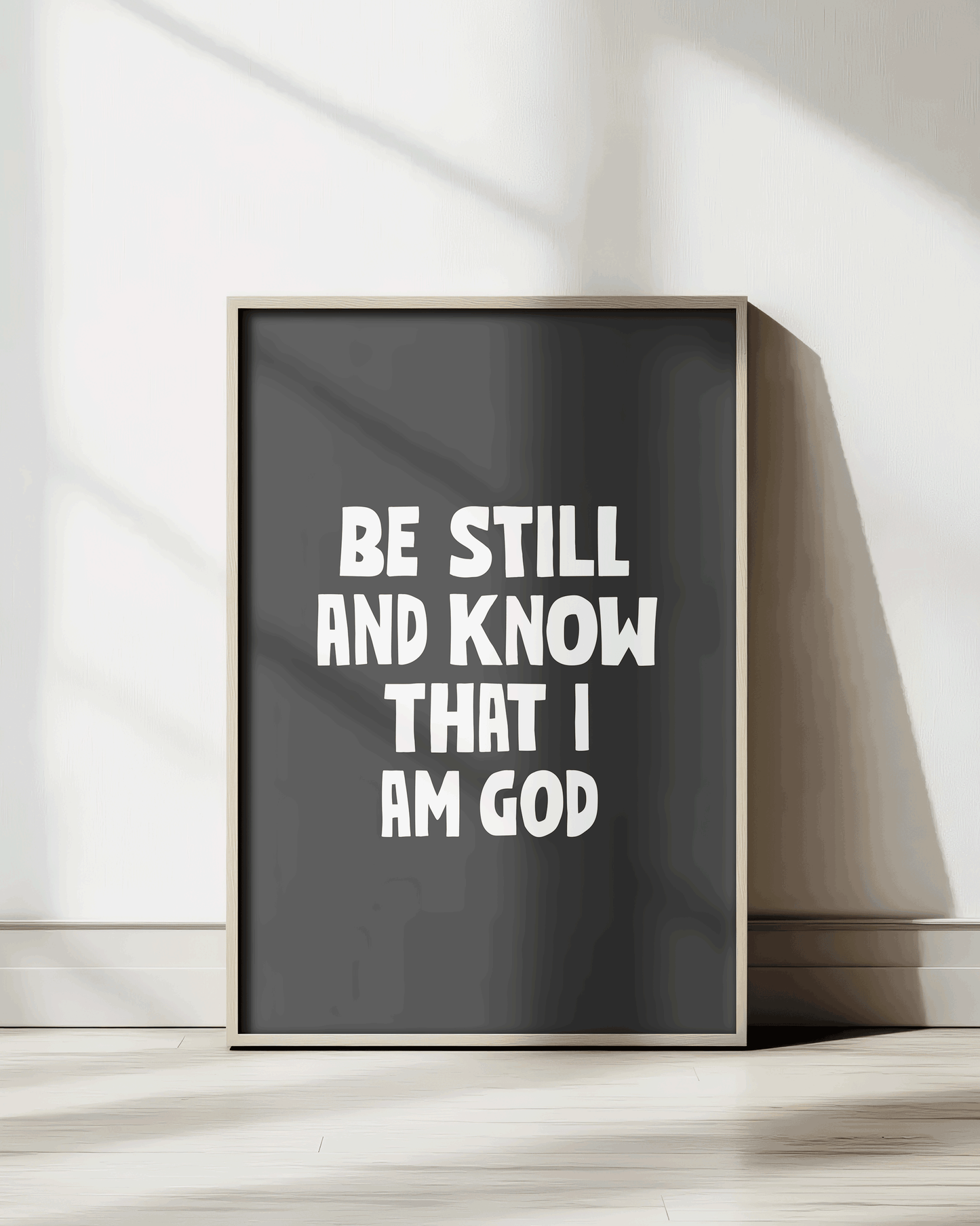 be still and know that i am god black Bold modern typographic Bible verse print framed mockup hoolyprints