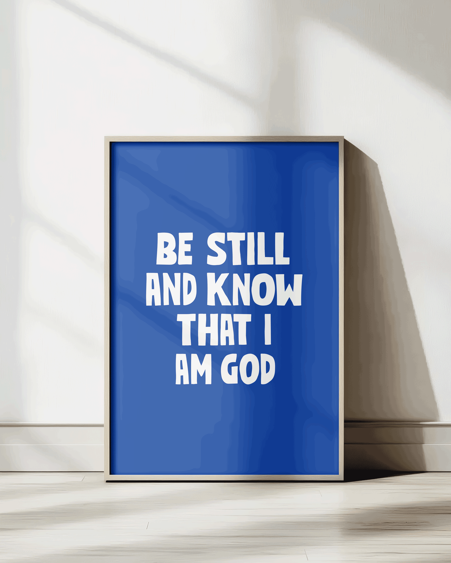 be still and know that i am god blue Bold modern typographic Bible verse print framed mockup hoolyprints